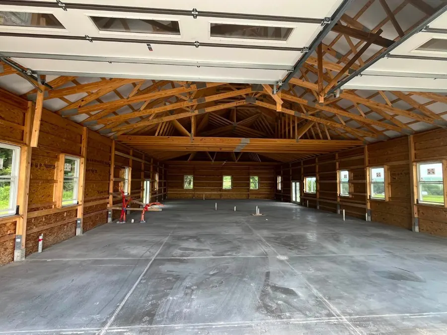 Finished barndominium floor under the trusses