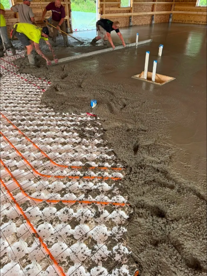 Radiant heat tubing on insulation board as the floor is poured over it