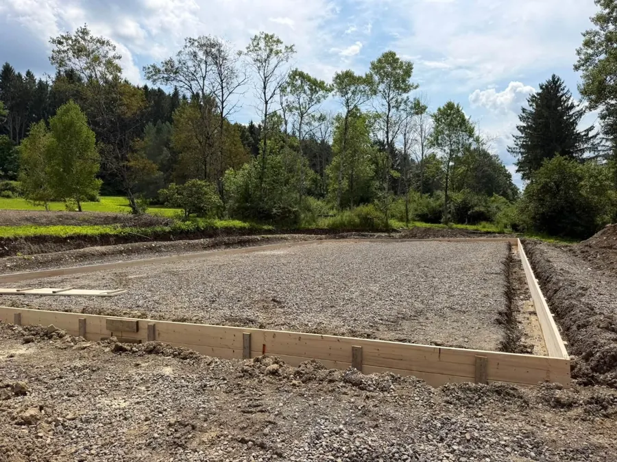 Wood forms set on a crushed stone base, ready for a slab pour